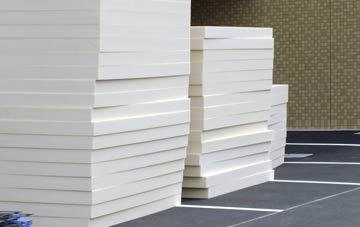 Stoke Abbott flat roof insulation costs